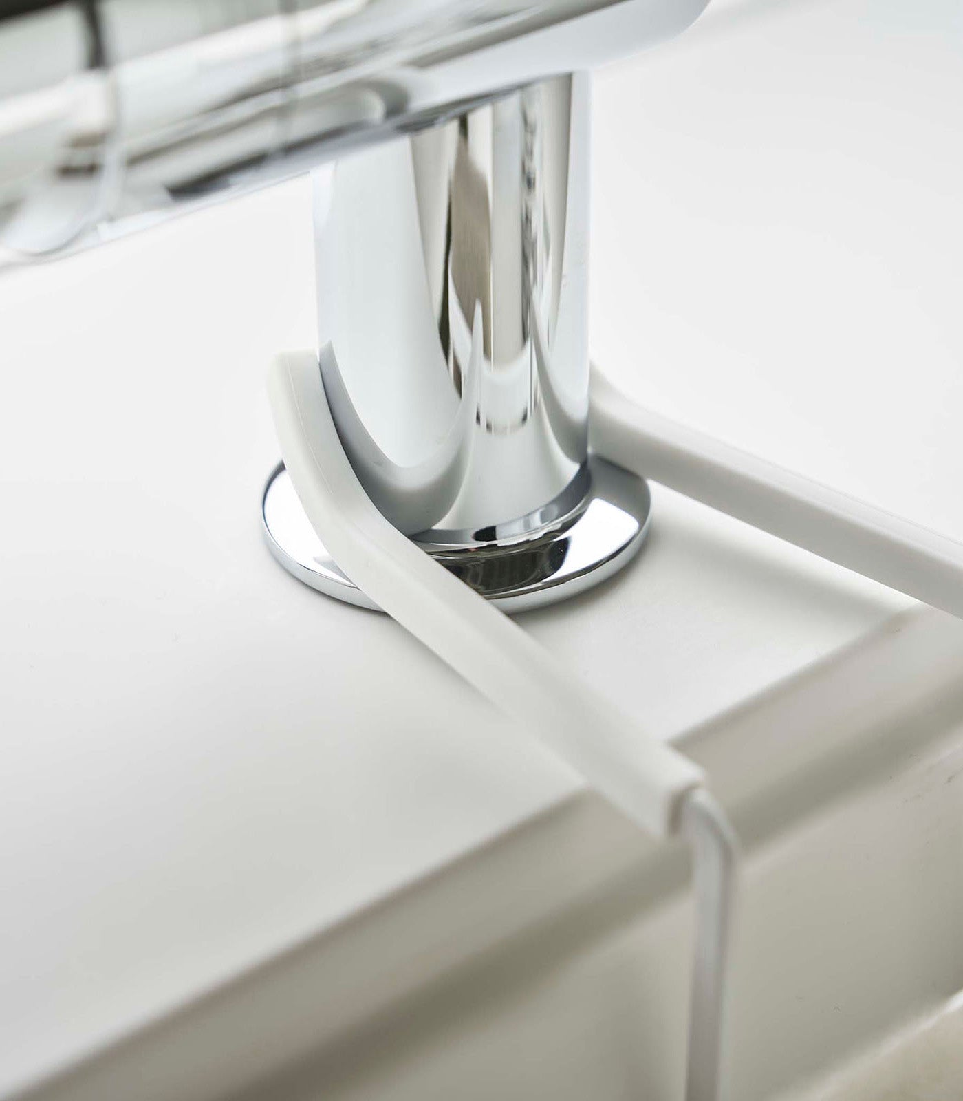 Faucet-Hanging Sponge Caddy by Yamazaki Home