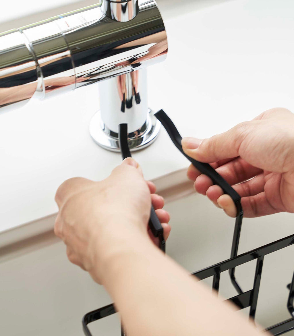 Faucet-Hanging Sponge Caddy by Yamazaki Home